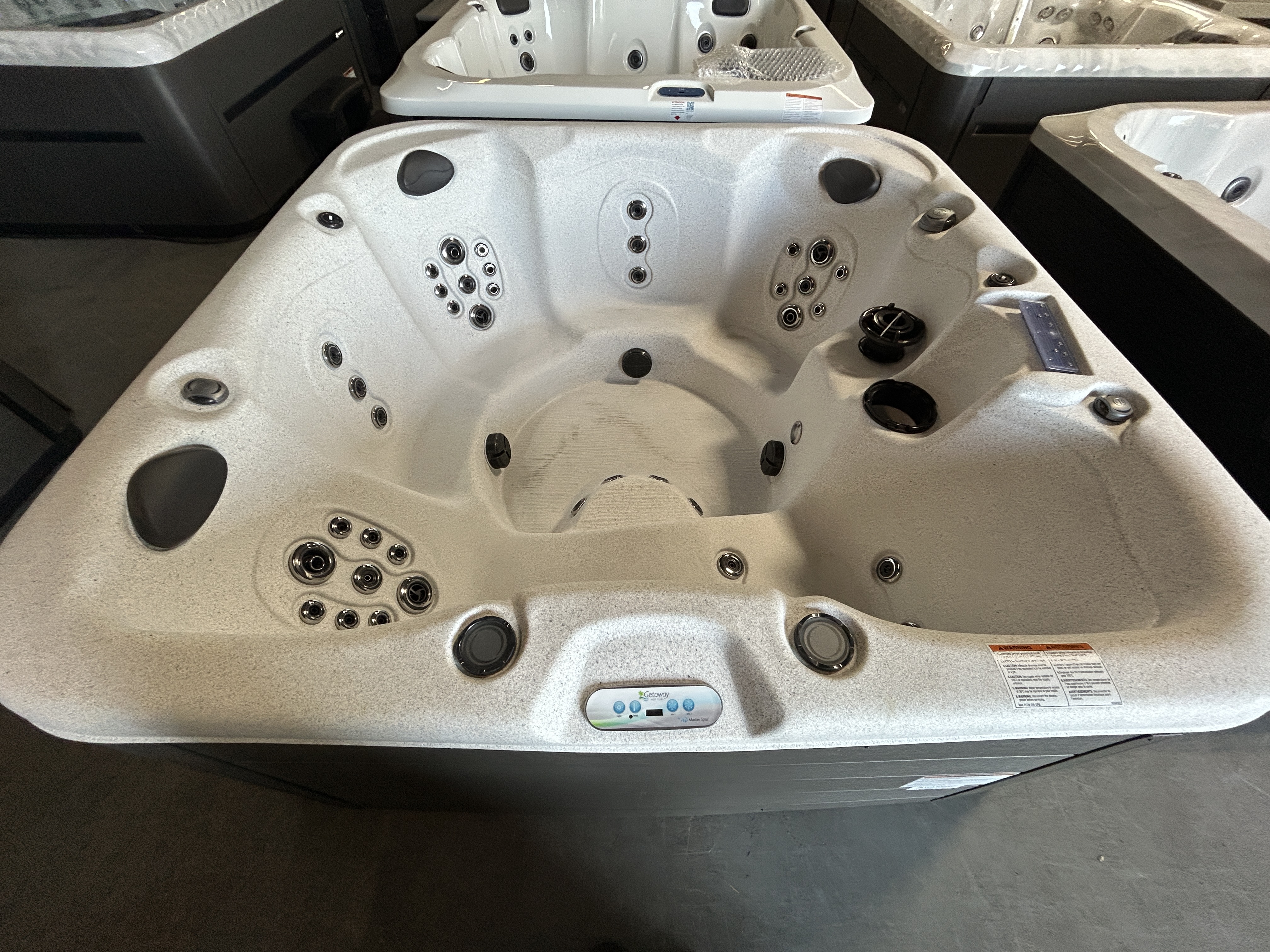 Master Spas Bar Harbor LE on the showroom floor - front view