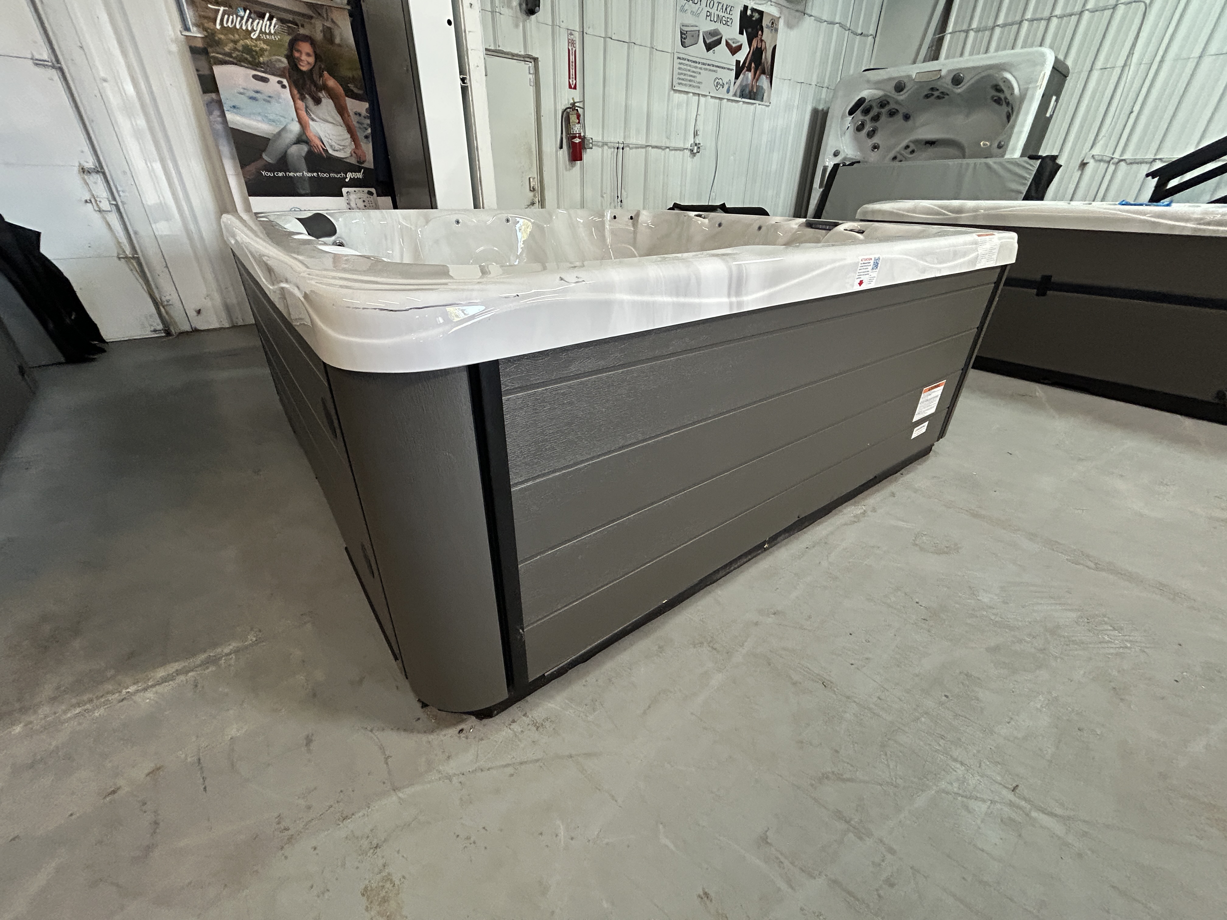 Master Spas Balance 8 on the showroom floor - graphite skirting